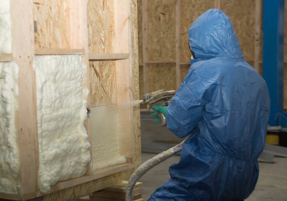 Attic Man spraying foam insulation in a Jacksonville, Florida home