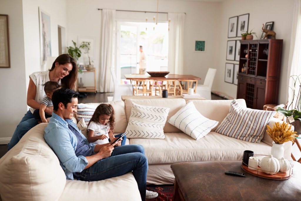 Happy family enjoying their home during new insulation install