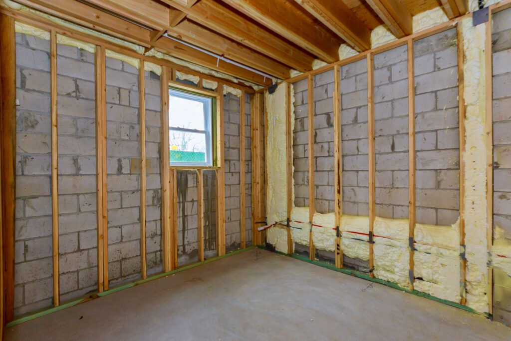 Spray foam insulation on basement walls